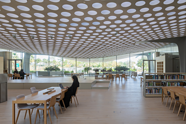 The east end of the building showing a study area and temporary raised platform – photography by Iwan Baan, courtesy of DS+R Architects